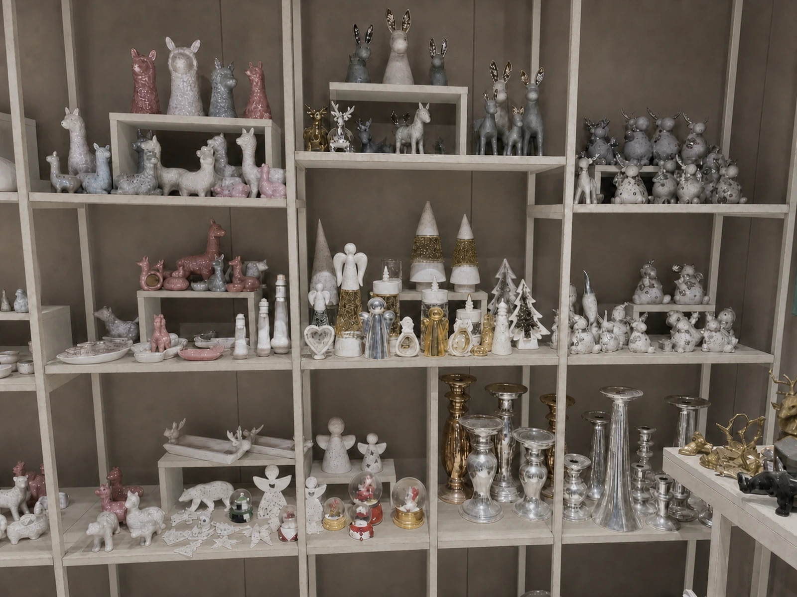 LWTIN ceramic finish and sample library on champagne metal and glass shelving